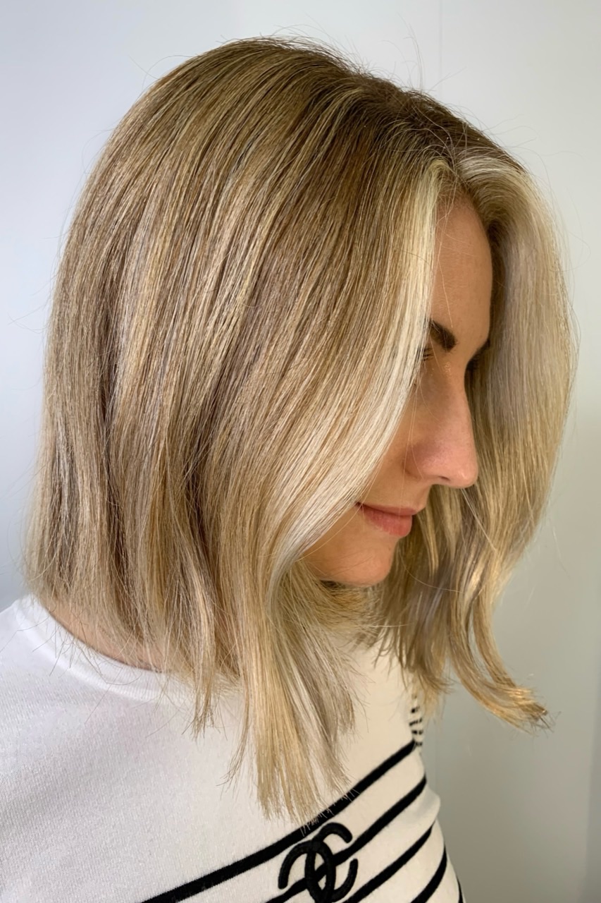 Client A after her second blonde colour visit, showing an integrated dimensional result