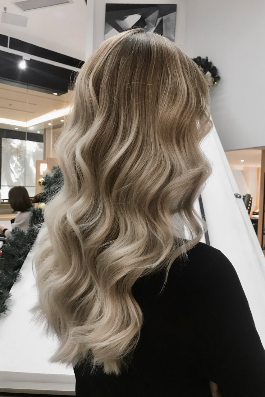 Client A after vanilla blonde balayage, showing a soft root transition and cool creamy dimension