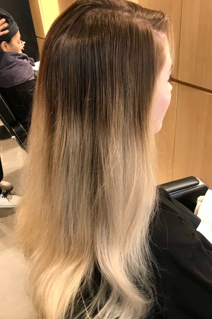 Client A before balayage with six months of dark regrowth and previously lightened lengths