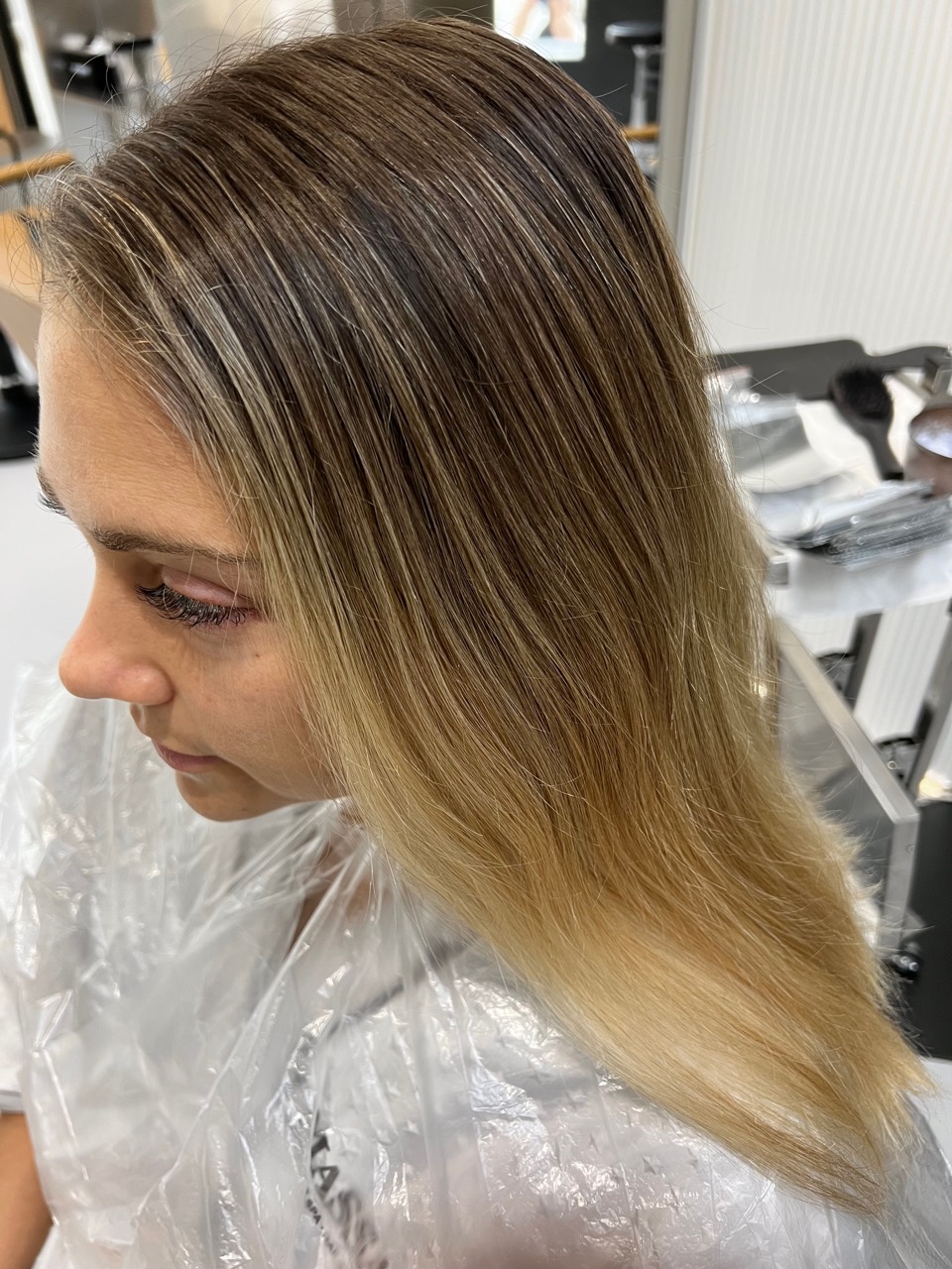 Client B before balayage with grown-out natural highlights and lighter blonde ends