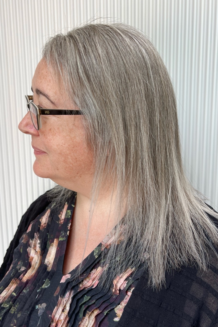 Finished grey blending result showing even silver grey from the parting through the lengths